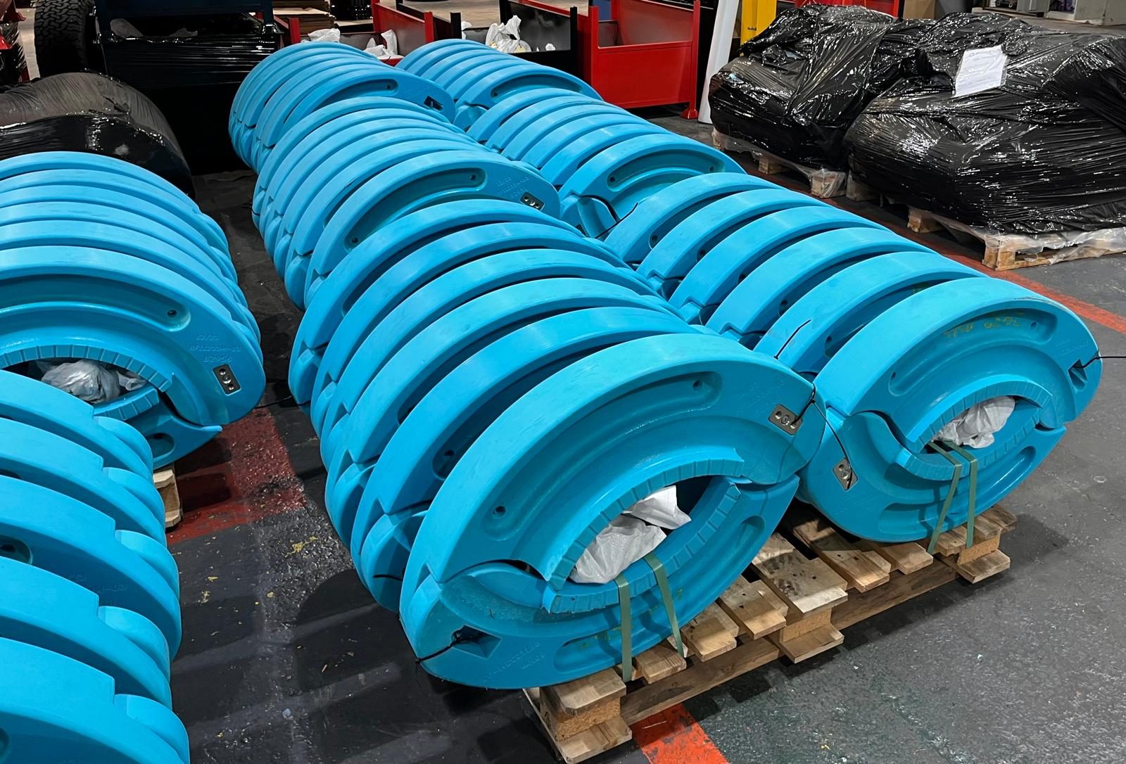 Pallets of composite RunFlat segments staged in the Toota Group warehouse